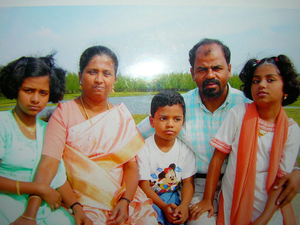 Mr Parmeshwaram with his wife and three children