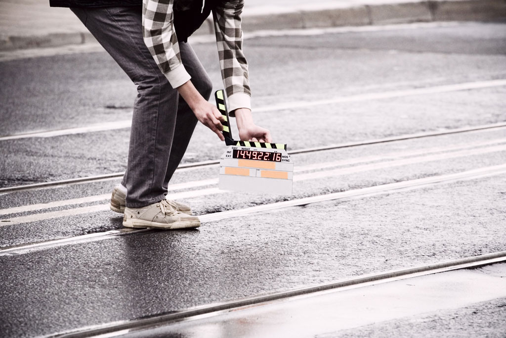 Man holding take board 