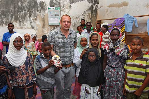 Gery Keszler in Zanzibar visiting a  Clinton Foundation project © Clemens Groh