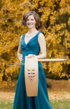 Carolina Eyck playing the theremin