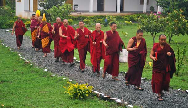 The monastery’s officials lead Nicky to the temple