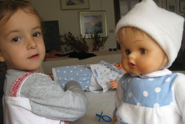 Girls with Cicciobello doll