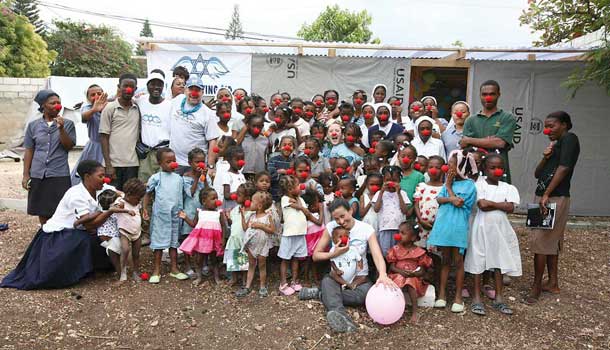 Children and doctors with red noses