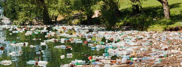 Lake with lots of plastic bottles in the water