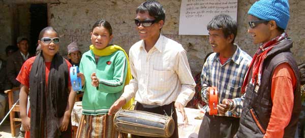 Blind musicians playing to a crowd